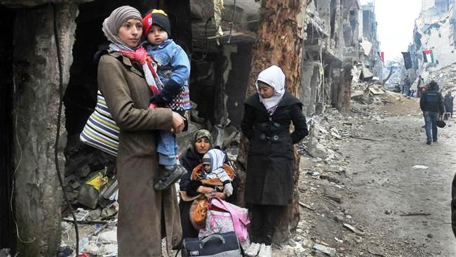 Residents of the Yarmouk Palestinian refugee camp