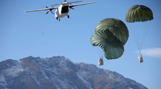 Blackwater CASA 212 over Afghanistan dropping supplies to U.S. Army soldiers