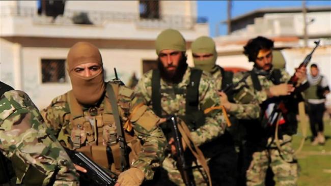 This file photo posted on the Twitter page of the al-Nusra Front terrorist group on April 1, 2016, shows the militants marching toward the northern village of Ais, Aleppo Province, Syria. (AP)