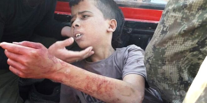 Aleppo-Child-behead-terrorists
