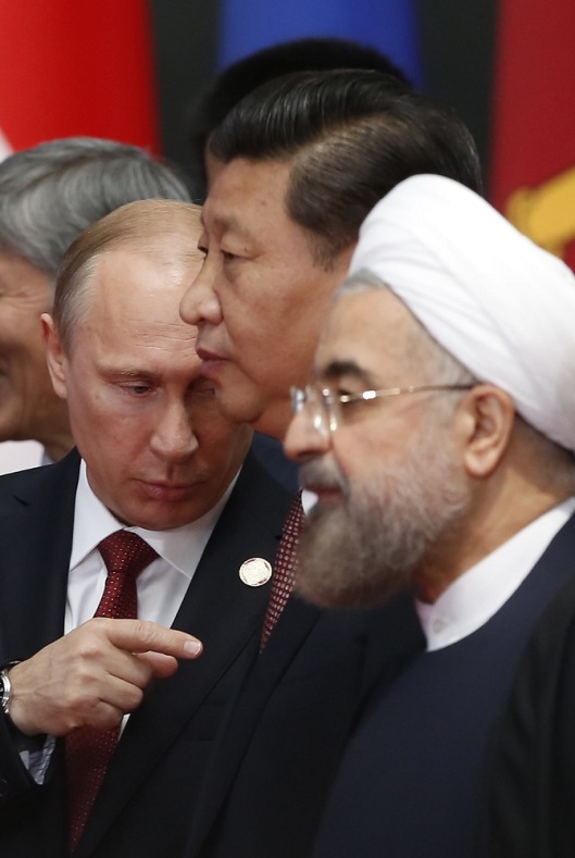 russian-president-vladimir-putin-chinese-president-xi-jinping-iranian-president-hassan-rouhani-670x1000